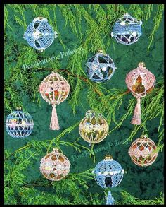 an image of christmas ornaments hanging from a tree