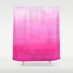 a pink and white shower curtain with the color ombretta on it's side