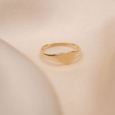 14k Solid Gold Heart Signet Ring Built to last a lifetime and more. Material: Solid 14k Gold Handmade to order. Please allow 1 - 2 weeks for processing. Dainty Everyday Rings Stamped 14k, Dainty Yellow Gold Signet Ring For Everyday, Dainty Engraved 14k Gold Ring, Dainty Yellow Gold Midi Rings Stamped 14k, Dainty 14k Gold Stackable Signet Ring, Dainty Yellow Gold Signet Ring In Recycled Gold, Dainty Yellow Gold Recycled Signet Ring, Dainty Everyday Signet Ring In Recycled Gold, Dainty Recycled Yellow Gold Signet Ring