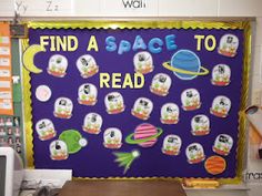 a bulletin board with space related items on it in a classroom setting that reads, find a space to read