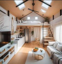 a living room filled with furniture and a flat screen tv on top of a wooden floor