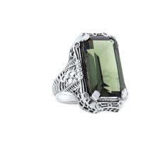 Vintage Estate 10.00 Carat Simulated Green Tourmaline Solitaire Filigree Ring. Floral Designs. 925 Solid Sterling Silver. Stamped 925. Excellent Condition/Like New, Classic Green Tourmaline Jewelry, Elegant Green Topaz Ring In Sterling Silver, Classic Green Amethyst Ring As Gift, Classic Green Amethyst Ring Gift, Classic Green Amethyst Ring For Gift, Classic Green Topaz Ring Gift, Classic Green Topaz Ring For Gift, Classic Green Crystal Ring For Formal Occasions, Classic Tourmaline Jewelry With Polished Finish