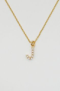 PRODUCT DETAILS Water Resistant💧 Brass 18K Gold with Pearls Gold Filled Chain Hypoallergenic Nickel Free SIZE: 15" + 3" Extender, Pendant: 7mm x 8mm. Closure: Lobster Clasp DESIGNER NOTE Dainty never goes out of style; enjoy the latest in the bestselling Initials Series. The Pearl Initials are crafted to elevate any layered look and fit any style. TREND ALERT: Pearls are HOT for the Spring and Summer this year! STYLE TIP: Pair with the I Love Double Choker and the Pearl Huggies for a truly dain Pearl Huggies, Piercing Inspo, Wishlist 2024, Jewelry Dainty, Initial Pendant Necklace, Diy Door, The Pearl, Letter Necklace, Pearl Size