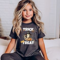 Cute cow halloween tees are perfect for fall and trick or treating! ❤️ Look cute and and have fun in this trendy tshirt.   Super soft, comfortable fabric with a trendy design makes it a great choice for everyday wear, whether you're errands or hanging out with friends. UNISEX sizing allows for a comfy fit for every shape and size! It's a great gift for any trendy shirt lover. These adorable shirts are MADE TO ORDER, JUST FOR YOU.  So please allow 3-5 days for processing time during non-peak season!   Grab yours today and enjoy a fun, comfortable tee in style! P R O D U C T ● F E A T U R E S ✔️Several Trendy Color Choices ✔️Perfect for everyday wear or chilling at home.  ✔️Makes a great gift  ✔️Grab one for yourself and all your friends! 🎉Grab one for all your friends and enjoy making memo Playful Black T-shirt For Fall, Casual Fall T-shirt With Cow Print, Cow Shirts, Cute Cow Print Cotton T-shirt, Cheap Casual Cow Print T-shirt, Cotton Cow Print T-shirt With Crew Neck, Halloween Cow, Cow Halloween, Cotton Cow Print Short Sleeve T-shirt