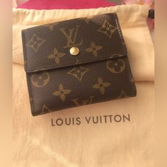 Louis Vuitton/ Monogram Canvas/Wallet/ 100% Authentic/ Can Be Used For: Bills, Checks, Credit Cards, Id, Driver License, There Is A Compartment For Coins//New / Never Used / No Box/ Dust Bag Like On Pic, Not From This Item But Lv Dust Bag/ Luxury Tan Wallet As Gift, Luxury Tan Wallets For Gift, Monogram Canvas Wallet With Original Box For Everyday Use, Elegant Bags In Monogram Canvas With Card Slots, Elegant Monogram Canvas Bag With Card Slots, Elegant Monogram Canvas Bags With Card Slots, Designer Gold Bifold Bag, Luxury Wallet In Monogram Canvas, Elegant Monogram Canvas Wallets For Everyday Use