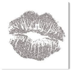 a black and white photo of a kiss on the lips with words written all over it