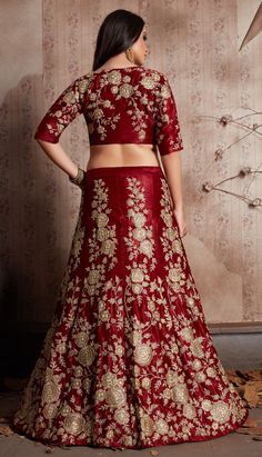 Semi Velvet Wedding Lehenga in Red and Maroon with Embroidered work Product Details: Fabric:Semi Velvet Work:Embroidered, Thread, Zari Color Family:Red and Maroon Occasion:Wedding Lehenga Dimension:530 Cm x 110 Cm ( L x W) Blouse Length:80 Cm Approx Washing Instruction:Dry Wash This is made to order product. We customize the pattern of the dress to suit your style and fitting. Once you place the order we will provide you with a template for measurements (to be taken in inches). It usually takes Red Sharara With Floral Embroidery For Navratri, Bollywood Red Sharara With Floral Embroidery, Red Floral Embroidery Sharara For Navratri, Red Floral Embroidered Sets For Navratri, Red Floor-length Traditional Wear With Floral Embroidery, Red Sets With Floral Embroidery For Navratri, Red Anarkali Lehenga With Floral Embroidery, Red Saree Set With Floral Embroidery, Red Semi-stitched Sharara With Floral Embroidery