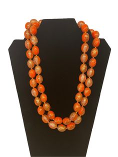 Vintage Retro 70s 80s Orange Gold Swirl Double Strand Beaded Necklace Floral Finial style Flower Neck Clasp Cute Vtg Costume Jewelry Good vintage condition. Measurements shown in photos. Display measurements also shown for size reference. Very lovely set of vintage costume jewelry with double strand beaded necklace. Orange and gold swirl beads with flower blossom  style clasp and long beads. Beautiful set. Feel free to message with any questions.  NOTE: Please keep in mind that, when you purchase vintage , it might not be perfect, but it will be authentic. No returns will be accepted on vintage items so make sure that you read the description and look at the pictures before committing to a. Please contact me if you have additional questions about the nature and condition of the product 1970s Jewelry Vintage 70s Necklaces, 70 Jewelry Style, 70s Beaded Necklace, 70s Accessories Jewelry Vintage, 70's Jewelry, 70s Jewellery, 70s Necklace, 70s Jewelry Accessories, 70s Accessories Jewelry