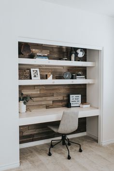 a white desk and chair in a room