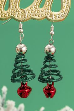 christmas tree earrings with red and green beads hanging from it's earwires