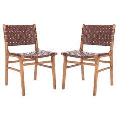 a pair of wooden chairs sitting next to each other