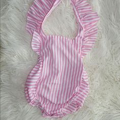 Striped Pink Romper Adjustable Tie Never Worn 12 To 18 Month Pink Casual Bubble Romper For Playwear, Casual Pink Bubble Romper For Playwear, Casual Pink Bubble Romper For Playtime, Pink Bubble Romper For Spring Playwear, Pink Bubble Romper For Playwear In Spring, Pink Playful Bubble Romper For Playwear, Playful Pink Bubble Romper For Playwear, Casual Fitted Pink Bubble Romper, Pink Casual Bubble Romper For Playdate