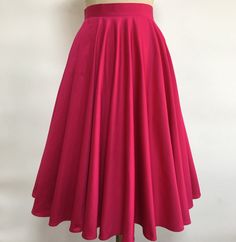 1950s style Full Circle Skirt Details: * Quality Cotton with spandex * Two side pockets * Standard Knee Length  from waist to Hem  28 inch approx Sizes -------Waist (inch） 00        --     24           0          ---    25            2           --     26              4           --    27          6          --     28            8          --     29          10         --    30           12        --     31.5 14          ---   33 16          ---   35.5 18          ---   38 20        ---   40.5 22        ---    43 24       ---     45.5      Don't hesitate to inquire about custom orders; we're more than happy to accommodate your requests. Box Pleat Skirt For Party, Party Fitted Box Pleat Skirt, Fitted Box Pleat Party Skirt, Fitted Solid Skirt With Pockets, Fitted Box Pleat Skirt For Party, Fitted A-line Bottoms With Box Pleat, Fitted Box Pleat Midi Skirt, Fitted Long Skirt With Box Pleat, Retro Fitted Skirt With Pockets