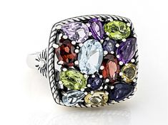 1.03ctw Glacier Topaz™, 0.88ctw Amethyst, 0.41ctw Iolite, 0.90ctw Manchurian Peridot™, 0.92ctw Garnet, and 0.34ctw Citrine Sterling Silver Oxidized Ring. Measures Approximately 0.80"L x 0.74"W. Not Sizeable. Elegant Multicolor Amethyst Gemstone Ring, Elegant Multicolor Amethyst Ring With Gemstone Accents, Multicolor Oval Gemstone With Center Stone, Elegant Multicolor Amethyst Ring With Accent Stones, Elegant Multicolor Gemstones With Center Stone, Anniversary Multicolor Gemstones With Accents, Multicolor Oval Amethyst Ring With Gemstone Accents, Multicolor Gemstones With Accent Stones For Anniversary, Elegant Multicolor Amethyst Ring For Anniversary