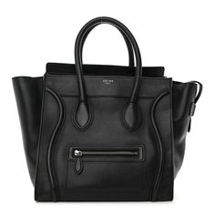 This is an authentic CELINE Drummed Calfskin Mini Luggage in Black. This chic travel tote is crafted of calfskin leather in black. The bag features rolled leather top handles, expandable sides, a facing zipper pocket and a top overextended zipper. This opens to a spacious black interior with zipper and patch pockets. Luggage Black, Mini Luggage, Celine Luggage Bag, Natural Tan, Travel Tote, Black Interior, White Bag, Leather Top, Tri Color