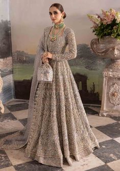 Pakistani Bridal Dress in Classic Gown Lehenga Style is a royal attire adorned with Hand-crafted details of embellishments. Custom sizes. Fast shipping. Gown Lehenga, Royal Attire, Grey Lehenga, Classic Gown, Pakistani Bridal Dress, Nikah Dress, Lehenga Gown, Pakistani Suit, Lehenga Style