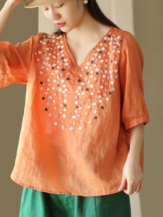 Material: 100% Ramie Collar: V-Neck Pattern: Flower Sleeve Type: Regular Sleeve Sleeve Length: Half Sleeve Highlight: Spliced Season: Summer Spring Floral Embroidered V-neck Top, Floral Embroidered V-neck Top With Relaxed Fit, Embroidered Orange V-neck Tops, Orange Embroidered V-neck Top, Spring V-neck Top With Floral Embroidery, Spring Floral Embroidery V-neck Top, Spring Embroidered V-neck Top, Embroidered V-neck Top For Spring, Flower Sleeve