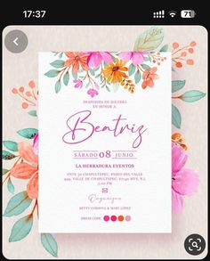 a wedding card with flowers and leaves on the front, in pink and orange colors