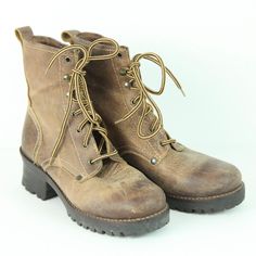 Vintage 90s/Y2K MIA brown leather chunky heel lace up combat boots. They are a size 8.5 The leather has a distressed/crackle finish to it but there are also some scuffs to uppers, minor wear to soles/heels. Please see all photos for condition. The heel is 2" The boot shaft is 6" tall not including the heel. 22 Leather Combat Boots With Lug Sole In Grunge Style, Leather Grunge Combat Boots With Lug Sole, Grunge Leather Combat Boots With Lug Sole, Leather Combat Boots For Winter In Grunge Style, Winter Leather Grunge Combat Boots, Grunge Leather Combat Boots For Winter, Winter Grunge Leather Combat Boots, Grunge Leather Moto Boots With Lug Sole, Rugged Brown Combat Boots For Fall