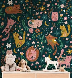 an animal themed wallpaper with cats, flowers and stars on the dark green background