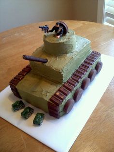 a birthday cake made to look like a tank