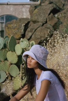 Lack of color wave bucket hat in purple lavender print terrycloth. cool and simple bucket hat. throw on this easy to wear style for a sun-safe street look.    brimmed bucket hat design ft. small side pocket.    brim measures 7.5 cm / 2.95". spot / hand wash.    bucket hat sizing: s / m - 55 - 56cm m / l - 57 - 58cm    pipe and row Iconic Hair, Bucket Hat Design, Terry Towelling, Rancher Hat, Lack Of Color, Color Wave, Hat Design, Halo Style, Beach Lifestyle