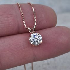 "Moissanite Solitaire Necklace VIDEO * Check out an HD video of our beautiful Moissanite pendant to appreciate its true beauty, simply copy & paste the link below: https://youtu.be/cN3POJeAqgw * This is a beautifully faceted, high quality Moissanite gemstone pendant with brilliant flashes with each and every subtle movement. Our Moissanite gemstones have been hand cut by quality Artisan gemstone artists, resulting in ultra fine brilliance, luster and fire. They shine like diamonds without the pr Necklace Video, Mothers Day Jewelry, Diamond Pendants Designs, Modern Gold Jewelry, Moissanite Pendant, Solitaire Necklace, Gold Chain With Pendant, Moissanite Necklace, Solitaire Necklaces