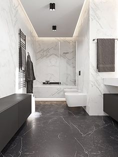 a bathroom with black and white marble flooring