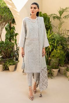 Brand: JAZMINProduct Code: IL-SS24-D2Collection: Iris by Jazmin Eid Lawn Unstitched Spring Summer CollectionFabric: Lawn DESIGN DETAILS: Digital Printed Embroidered Lawn Front Panel Digital Printed Embroidered Lawn Front Side Panels Embroidered Sleeves Borders Embroidered Front & Back Borders Digital Printed Embroidered Organza Dupatta Borders Embroidered Staple Dobby Net Dupatta Digital Printed Lawn Back & Sleeves Digital Printed Cambric Trouser DISCLAIMER:* Lining, Laces, and Tassels are not included in unstitched variants.* Embellishment items in stitched outfits are subject to market availability.* The actual colors of the outfit may vary from the colors being displayed on your device. CARE INSTRUCTIONS: Extra Fabric Has Been Used For Shoot Original Color May Vary Slightly From The Pic Unstitched Elegant Embroidered Cambric Fabric, Elegant Unstitched Embroidered Cambric Fabric, Elegant Long Sleeve Salwar Kameez With Cutwork, Elegant Festive Traditional Wear With Cutwork, Semi-stitched Cutwork Sets For Eid, Designer Semi-stitched Cutwork Sets, Unstitched Elegant Kurta With Cutwork, Elegant Unstitched Cutwork Kurta, Elegant Unstitched Kurta With Cutwork