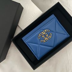 Chanel Card Holder In Beautiful Blue Lambskin. Brand New Comes With Dust Bag, Tags, Box, Bag And Even Ribbons!! Also Have The Receipt For Validation, Purchased From Beverly Hills Store. Formal Blue Bags With Card Slots, Classic Blue Bag With Original Box, Designer Blue Bags With Card Slots, Blue Designer Bags With Card Slots, Designer Blue Wallet For Formal Occasions, Luxury Blue Wallet For Formal Occasions, Designer Blue Wallets For Formal Occasion, Formal Blue Wallets With Interior Card Slots, Elegant Blue Evening Wallets