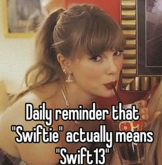 a woman drinking from a cup with the caption daily reminder that swftie actually means swift