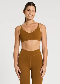 Intended for an A-C cup, low-intensity workouts Adjustable straps to customise your fit Soft V-neckline is easy to layer over your fave studio tops Removable cups Made from buttery soft StudioLuxe Nimble Activewear, Low Intensity Workout, Flare Legging, Women's Sports, Designer Shorts, Short Leggings, Color Shorts, Bra Styles, Leggings Fashion