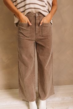 Close up of model wearing the Jenna Brown Jeans. These are brown jeans with a wide leg look, pockets on front, button closure, and belt loops. Brown Beige Aesthetic Outfits, Brown Pants Fall Outfit, Outfits With Brown Jeans, Thrift List, Crisp White Blouse, Brown Jeans, Faux Leather Purse, Fall 24, Soft Autumn