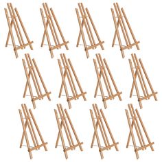 a set of twelve wooden easels sitting next to each other on a white background