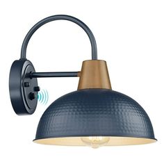 an image of a blue wall light with a wooden shade on the side and a white background