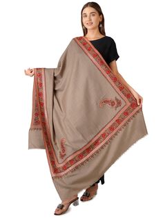 Discover artisanal excellence with our Handwoven Pashmina Shawl, meticulously crafted from pure Kashmiri pashmina in the exquisite Natural Toosh shade. This shawl embodies traditional craftsmanship and timeless elegance. Product Details: Handwoven Pashmina Shawl Material: Pure Pashmina (100% Cashmere) Size: 100 cm X 203 cm / 40 Inch X 80 Inch / 1.1 x 2.2 Yards (Approx) Base Color: Natural Toosh Embroidery: Delicate and detailed border embroidery Sourced From: Changthangi goats in the Himalayan r Traditional Drape Pashmina Shawl With Cutdana, Traditional Pashmina Shawl For Formal Occasions, Traditional Formal Pashmina Shawl, Traditional Formal Pashmina Dupatta, Formal Traditional Pashmina Dupatta, Elegant Cutdana Shawl, Designer Cutdana Shawl, Ceremonial Shawl For Festivals, Traditional Beige Dupatta For Formal Occasions