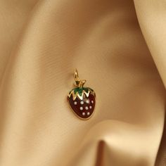 14K Solid Real Yellow Gold Enamel Red Green Strawberry Pendant Summer Fruit Themed Necklace Gift For Women Cable Chain Dainty Preety Luck To symbolize perfection and righteousness, medieval stone masons carved strawberry designs on altars and around the tops of pillars in churches and cathedrals. Strawberries symbolize spring and rebirth, as well as righteousness and love. The varied meanings come from different faiths and cultural traditions. Strawberry, one of the fruits of summer, is the symb Luxury Red Enamel Necklaces, Strawberry Necklace, Cultural Traditions, Green Strawberry, Tiny Elephant, Beautiful Gold Necklaces, Necklace Chain Lengths, Elephant Pendant, Summer Fruit