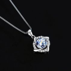 SPECIFICATIONSBrand Name: NeeTimItem Weight: otherOrigin: Mainland ChinaCertificate: YESMain Stone: MoissaniteMetals Type: silverMetal Stamp: 925,SterlingGender: WomenNecklace Type: Pendant NecklacesOccasion: AnniversaryChain Type: Link ChainItem Type: NECKLACESCertificate Type: grsStyle: ClassicSide Stone: Other Artificial materialCertificate Number: Gra certificationModel Number: D color VVS1is_customized: NoShape\pattern: RoundFine or Fashion: FineMain Moissanite: 0.5ct/1ctMain Moissanite Siz Moissanite Pendant, White Gold Pendant, Moissanite Necklace, Wedding Party Jewelry, Everyday Accessories, Party Jewelry, Light Reflection, Rose Gold Necklace, Rose Gold Color