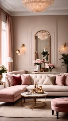 a living room filled with furniture and a chandelier