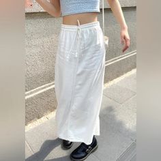 Long Straight Skirt With Two Back Pockets, Drawstring Waist And A Split At The Back. Fabrics: 70% Cotton, 30% Linen Measurements: 35" (88 Cm) Length, 28" (70 Cm) Waist (Stretches) Made In: China Nwot Casual White Wide Leg Maxi Skirt, White Wide Leg Skirt For Vacation, High Waist Cotton Maxi Skirt For Day Out, Casual Long Skirt For Daywear, White Cotton Relaxed Maxi Skirt, White Cotton Maxi Skirt With Relaxed Fit, Casual Cotton Maxi Skirt For Daywear, Casual Spring Daywear Maxi Skirt, Casual Maxi Skirt For Spring Daywear