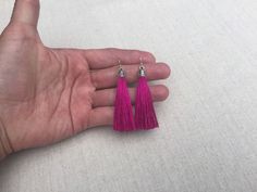 "Chic fuchsia pink tassel earrings! They would add a pop of color to any outfit for any occasion. Dress them up or down. They are timeless and versatile. They are lightweight, fun and unique! The tassels measure 2 1/8\" long by 1/4\" wide. They hang from simple silver ear wire hooks. Overall drop length is about 2 1/4\". Metal is allergy free plated silver. These are my latest creation! I have them available in many colors! Find them all under the category tassel earrings in my shop. Thanks for Pink Tassel Jewelry As A Gift, Pink Dangle Tassel Earrings For Gifts, Pink Tassel Earrings For Gift, Pink Tassel Earrings As Gift, Pink Statement Earrings, Pink Tassel Earrings, Celtic Knot Jewelry, Celtic Knot Earrings, Branch Earrings