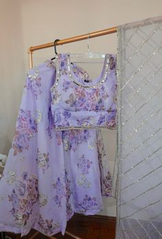 *3 piece set: lavender floral print embellished blouse, multi-layer organza skirt, and sequin net dupatta *Readymade Set --- Size Bust: 40/42inches *Please message us for size customization options!  *Color May Vary Slightly From Picture  *Our store is located in Los Angeles & in-store pick up is welcome! Designer Floral Print Organza Choli, Festive Organza Lehenga With Floral Print, Festival Organza Choli With Floral Print, Festive Floral Print Organza Lehenga, Festival Floral Print Organza Choli, Fitted Organza Lehenga With Floral Print, Floral Print Organza Choli For Party, Fitted Floral Print Organza Lehenga, Festive Floral Print Organza Choli