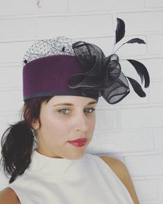 Stunning vintage hat from the 50's or 60's (I haven't found anything super old from this brand, but it is definitely pretty old and also the style of the 60s, this brand had a straw hat line in the 80s, but that is a different line than the Miami tags). Stiff wool felt, in a deep eggplant purple color. Contrast black large, stiff mesh bow. Black, see-through netting with polka dots. I do think the mesh is meant to sit on top and not pull across the face like some fascinators. Classic square pill Vintage Top Hat For Fall Party, Vintage Purple Party Hat, Retro Headpieces For Kentucky Derby Party, Winter Church Fitted Fascinator, Fitted Retro Party Headpieces, Retro Headpieces For Party, Winter Church Fascinator, Retro Party Headpieces For Kentucky Derby, Retro Kentucky Derby Party Headpieces