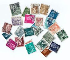 many different stamps are arranged on top of each other