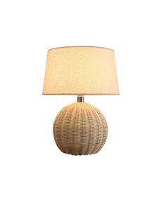 a table lamp with a white shade on it's base and a light bulb in the middle