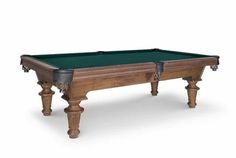 the pool table is made from wood and has green cloth on it's legs