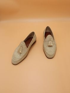 Welcome to our handmade art raffia shoes gallery for women and men made with love and patience to give the best experience you will wear . Note  : Each shoes takes 1.5 days to make no machine use. *Handmade in Morocco *Upper: 100% Raffia *Sole is made of leather SIZES :  Sizes start from EURO 40 (Male US 7-7.5) to EURO 46 (Male US 12). In order to be precise on the size please do the following: On a piece of white paper, make a sketch of your foot. Measure from the heel to the big toe diagonally in centimeters and send me the number. See 4th image for details. CHART SIZES For Men: EUUK USAUFoot Size: 3533.5321.6cm8.5 inches 3644.5422.2cm8.75 inches 374.554.522.8cm9 inches 385.565.524.1cm9.5 inches 396.576.524.7cm9.75 inches 4077.5725.4cm10 inches 417.587.526cm10.25 inches 4288.5826.6cm10.5 Elegant Summer Tassel Loafers Slip-on, Flat Heel Loafers For Summer Galas, Elegant Summer Slip-on Tassel Loafers, Beige Slip-on Moccasins For Summer, Summer Beige Slip-on Moccasins, Summer Closed Toe Loafers For Galas, Beige Summer Loafers With Closed Toe, Beige Closed Toe Loafers For Summer, Galas Slip-on Loafers With Woven Sole