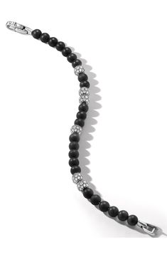 Sterling silver. Black onyx. Pavé diamonds, 3.14 total carat weight. Bracelet, 6mm. Push clasp closure. Imported. >Diamond Guide Elegant Black Jewelry With 8mm Beads, Luxury Onyx Jewelry With Black Beads, Luxury Formal Jewelry With Black Beads, Luxury Black Beads Jewelry For Formal Occasions, Adjustable Black Diamond Bracelet, Elegant Onyx Beaded Bracelets With Black Beads, Black Diamond Bracelet Jewelry, Luxury Black Round Beads Jewelry, Luxury White Gold Beaded Bracelets