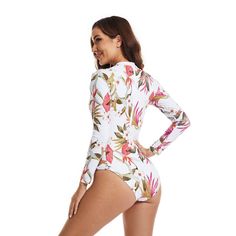 1. 82% Polyester. 18% Spandex2. UPF 50+ Sun Protective3.Flower Print4.Professional Surfing Design5. Removable PaddedFree ShippingGet mystery giftGet extra 10% off| $99+ SitewideNote:We recommend S=US 0-2. M=US 4-6. L=US 8-10. XL=US 10-12. XXL=US 14-16. Stretch Floral Print Swimwear For Surfing, Long Sleeve Floral Print Swimwear For Surfing, Poolside Stretch Floral Print Bodysuit, Poolside Stretch Bodysuit With Floral Print, Printed Long Sleeve Beachwear Bodysuit, Printed Long Sleeve Bodysuit For Beachwear, White Long Sleeve Stretch Swimwear, White Stretch Long Sleeve Swimwear, White Printed Swimwear For Surfing