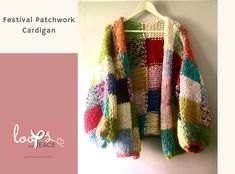 a colorful jacket hanging on a wall next to a pink and white sign that says festival patchwork cardigan